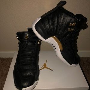 Jordan 12 women’s reptile black/white/gold size 7